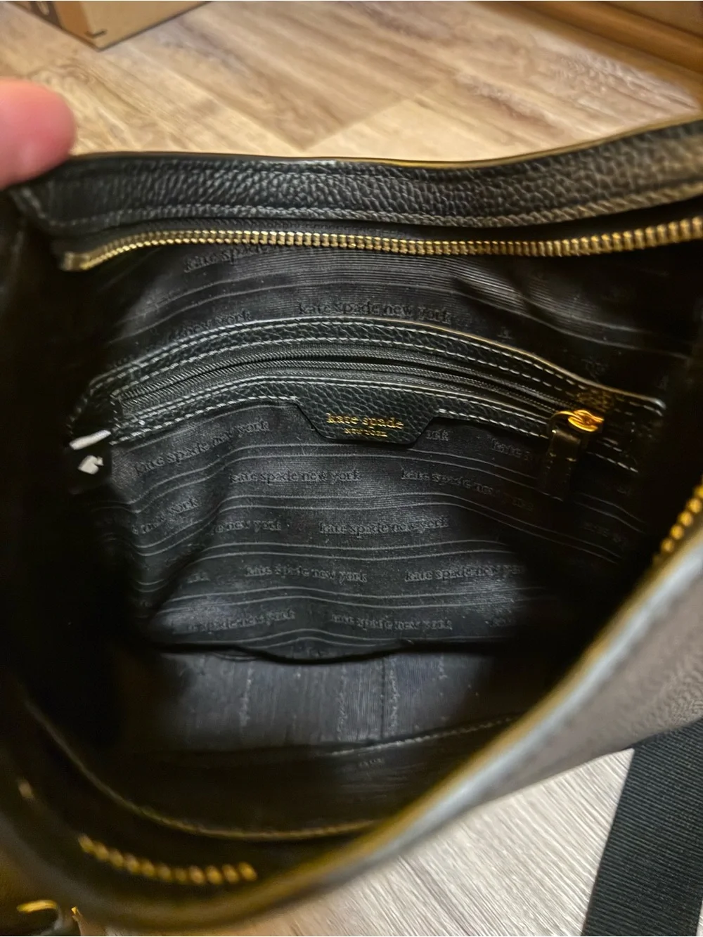 kate spade Black Pebbled Leather Curved Crossbody with Gold Hardware